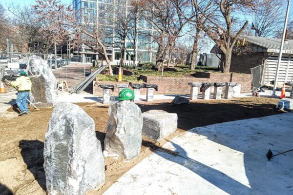 Workers preparing installation of the Irish memorial in Philadelphia